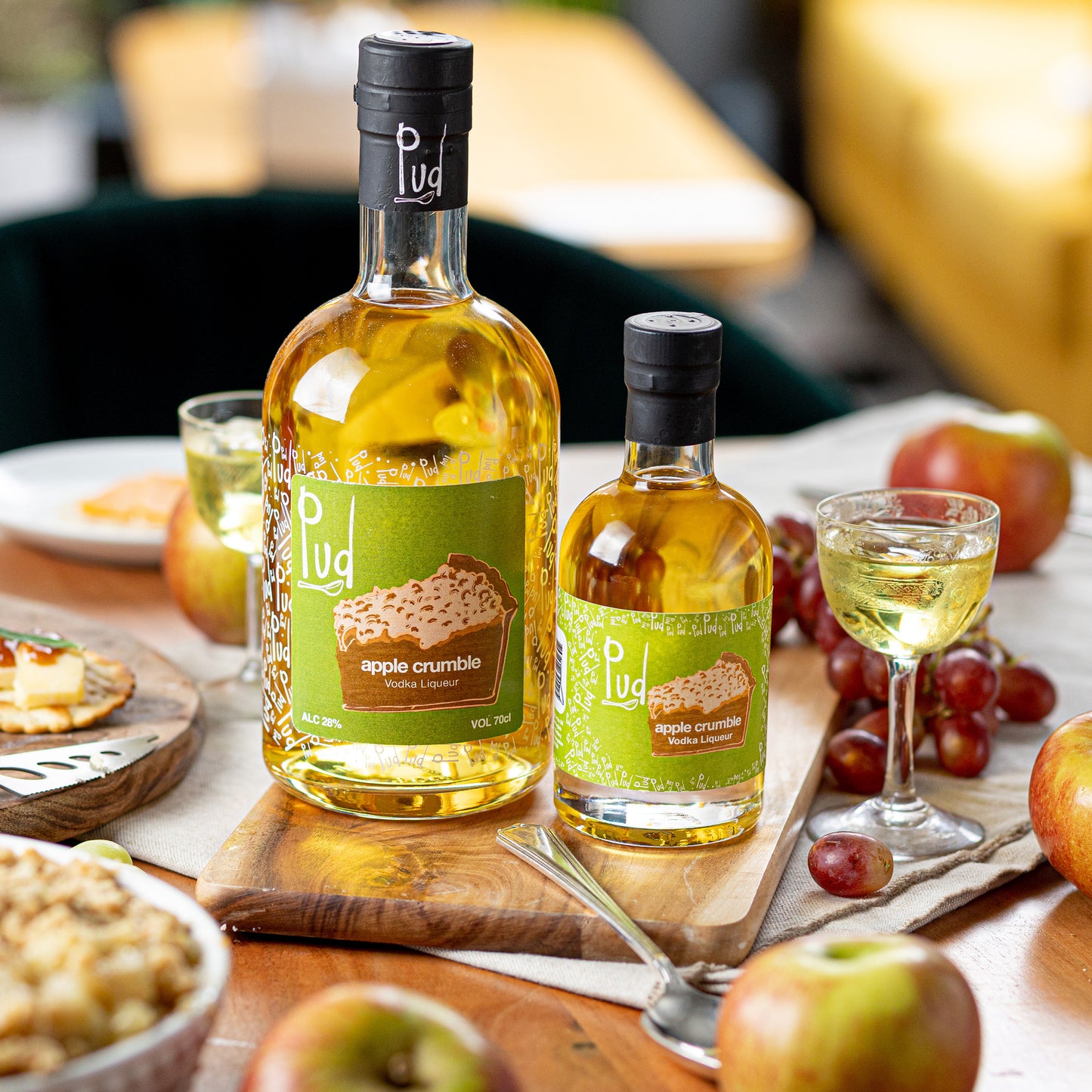 Pud Drinks apple crumble 70cl and 20cl on table